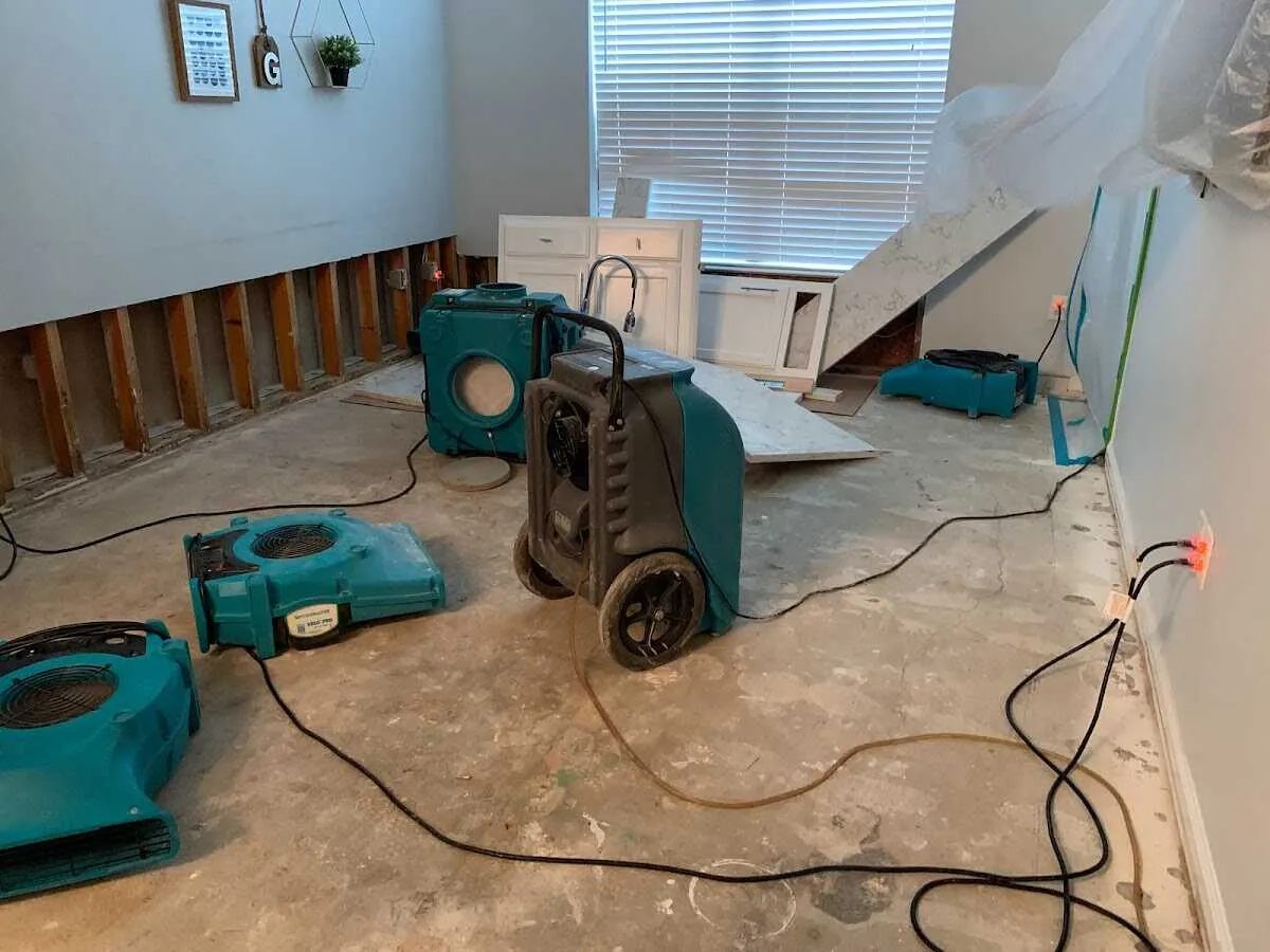 Dehumidifier in flood-cut room for Water Damage Restoration in Lake Elmo